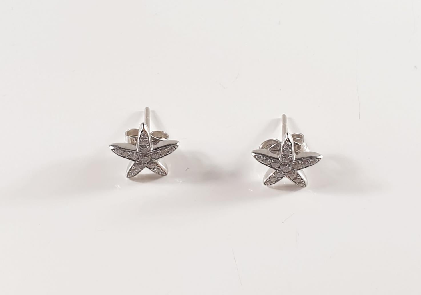 Sea Star collection, inspired in the Mediterranean sea colours...
Options metals 2 colours, , yellow and white 
READY TO SHIP
*Shipment of this piece is not affected by COVID-19. Orders welcome!*

STONES
◘ 15 -0.01ct and 1 -0.025ct total 0.175ct