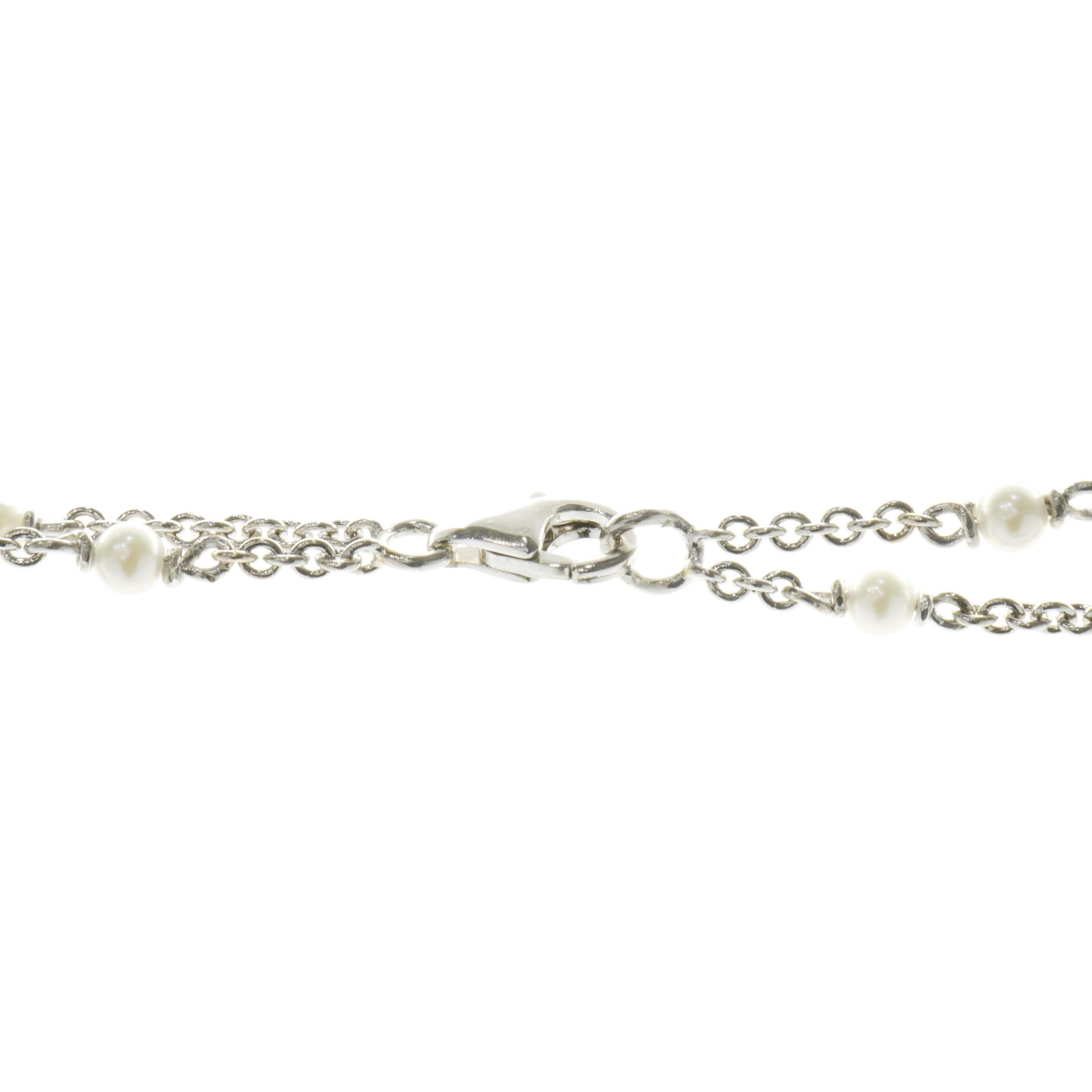 Designer: custom
Material: 18K white gold
Weight: 18.34 grams
Dimensions: necklace measures 26.25-inches