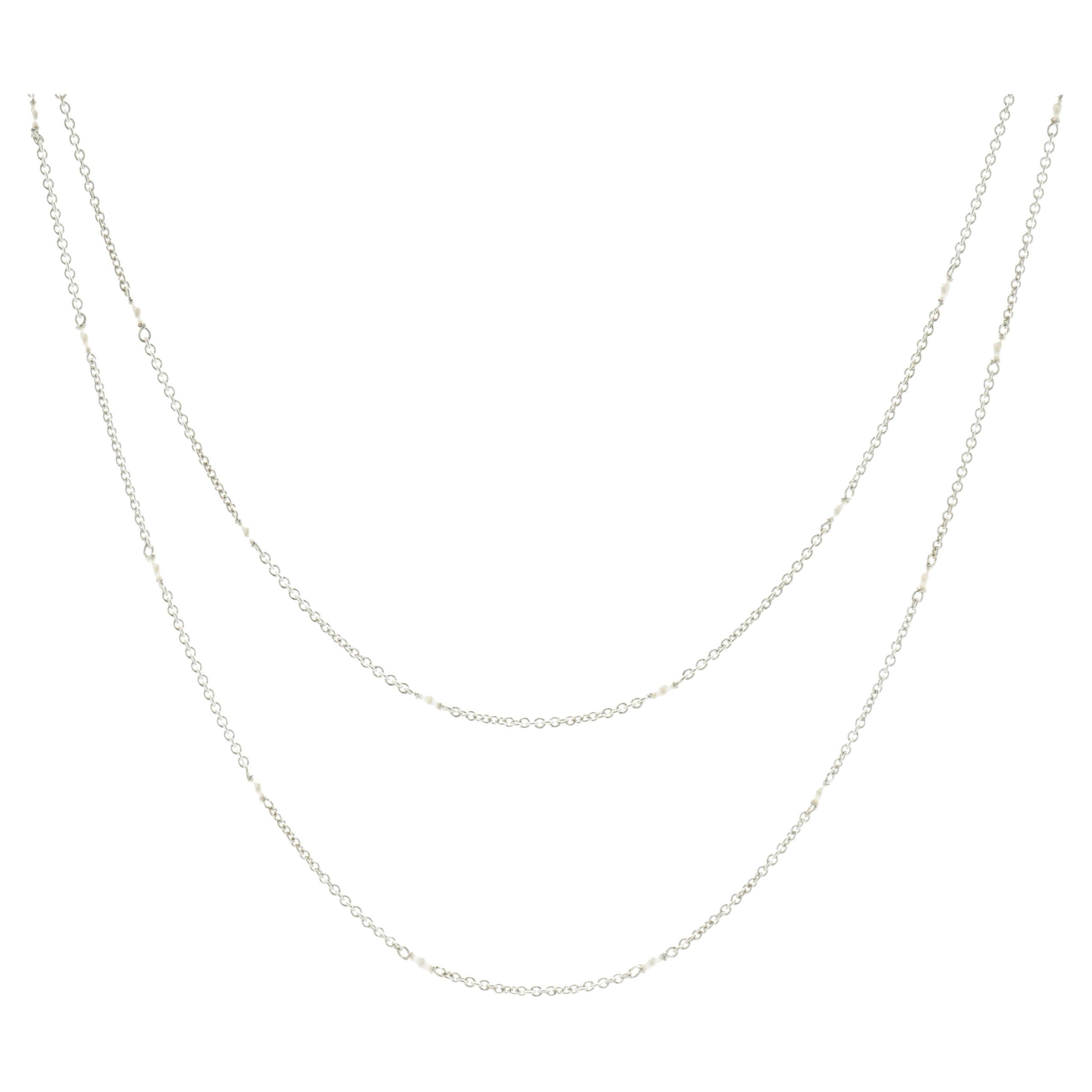 18 Karat White Gold Seed Pearl Station Necklace For Sale