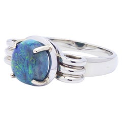 18 Karat White Gold 
Solid Cabochon Opal Ring