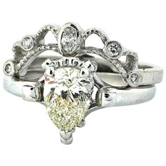 18 Karat White Gold Solitaire Diamond Wedding Ring and Diamond Keeper Ring Set