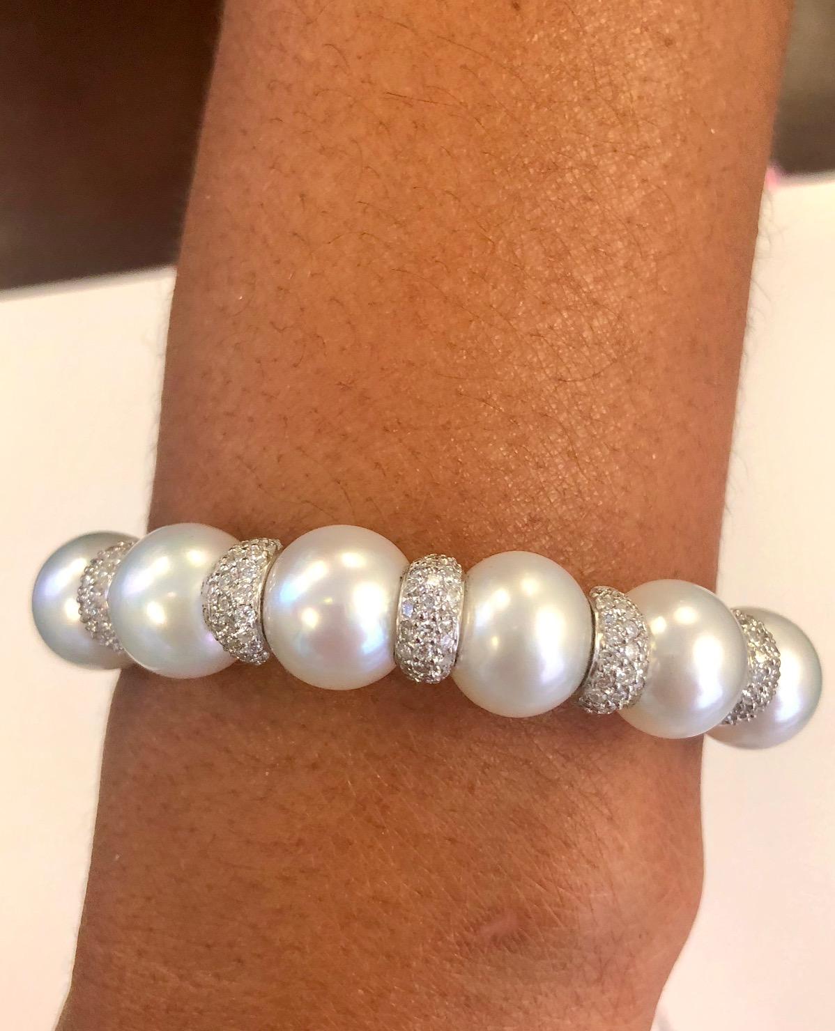 Our most popular spring-on bangle bracelet, made in 18 Kt White Gold, set with 196 Diamonds and Fine South Sea Pearls ranging from 13.0 to 10.50mm.  Also available with Tahitian Black Pearls or natural color Golden Pearls.
Many of our clients like