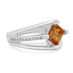 18 Karat White Gold Spessartite Garnet and Diamond Ring