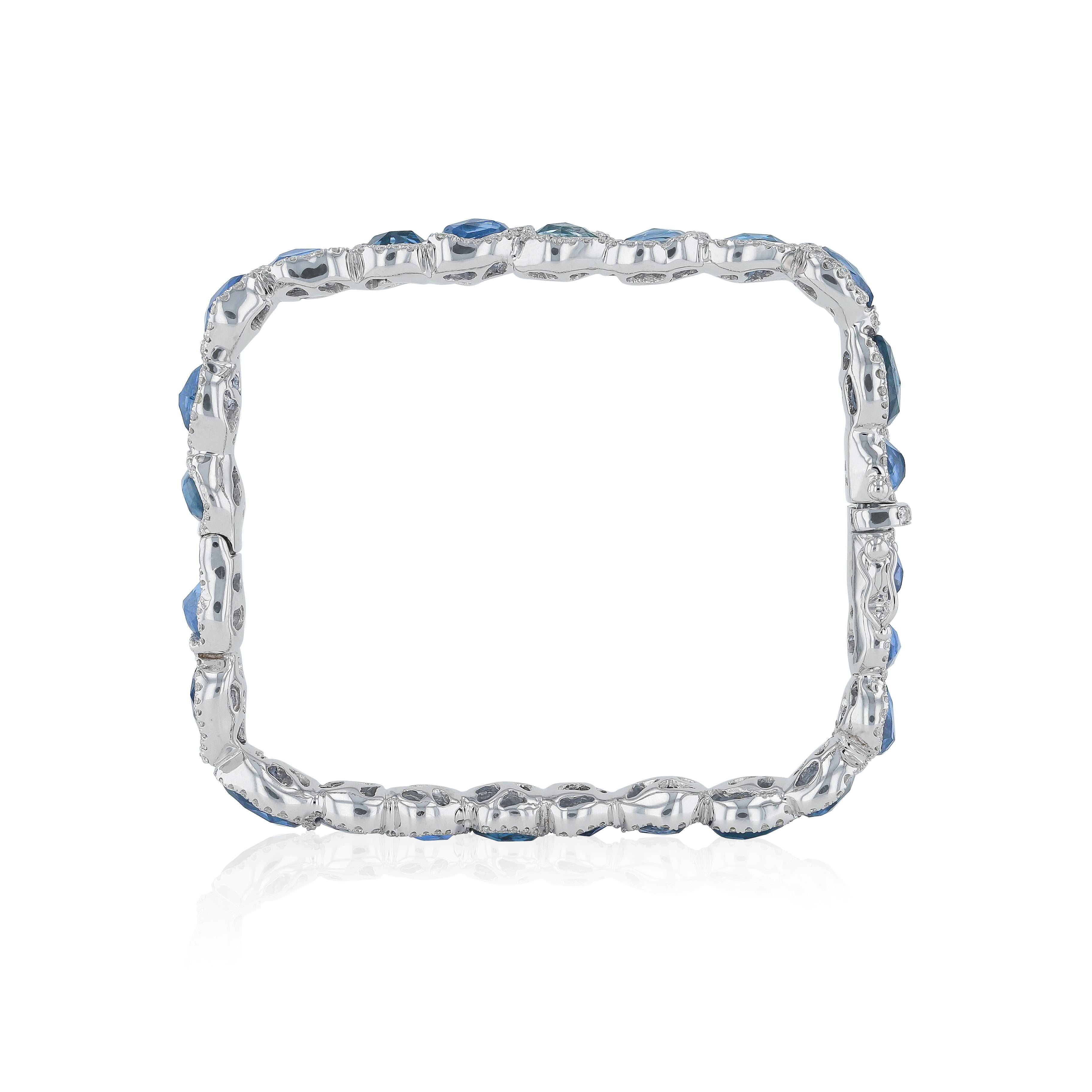 Modern craftmanship and design, this bracelet is designed for bold and unique women. It is defenitely a statement piece inspired by bold aesthetic and natural raw beauty. 
- Diamonds (Total Carat Weight: 1.88 ct) 
- Blue Sapphires (Total Weight: