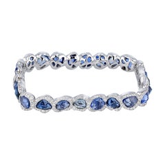 Bracelet jonc carré en or blanc 18 carats avec saphirs bleus