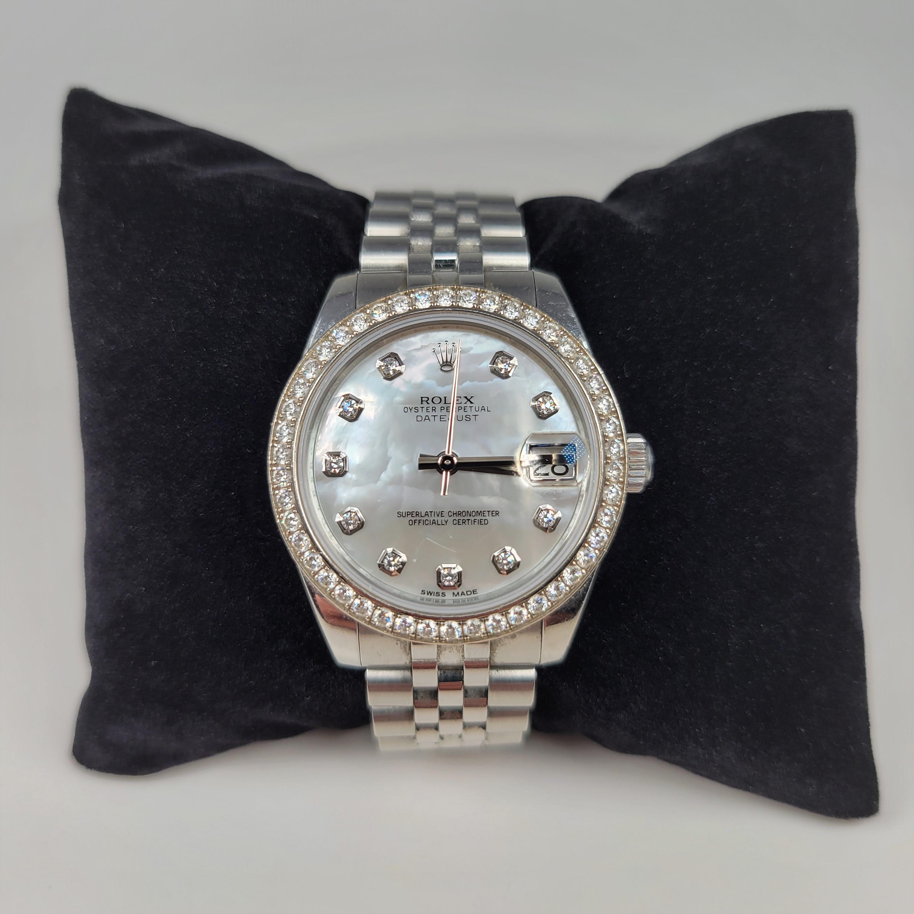 This wrist watch is composed of a stainless steel “Jubilee” bracelet, stamped SOZ, attached to a stainless steel and white gold case, stamped 178384, 92L18986 with a mother-of-pearl dial, stamped ROLEX, OYSTER PERPETUAL DATEJUST.  The dial supports