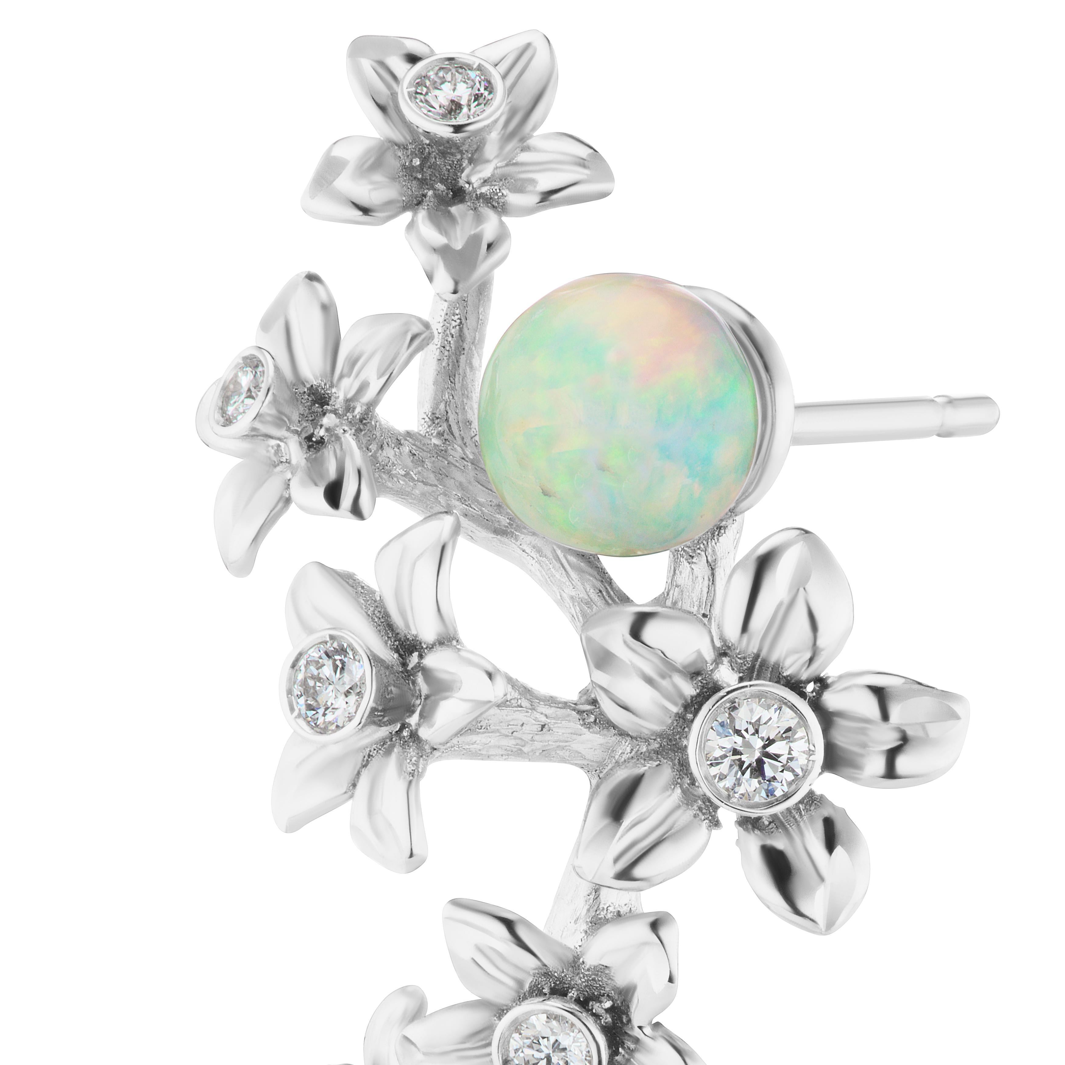 18K White Gold Star Jasmine Vine Earrings with Diamond and Opal Flowers.
Diamond accents 0.43 ct tw.
2