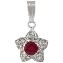 18 Karat White Gold Star with Center Ruby and Diamonds Pendant