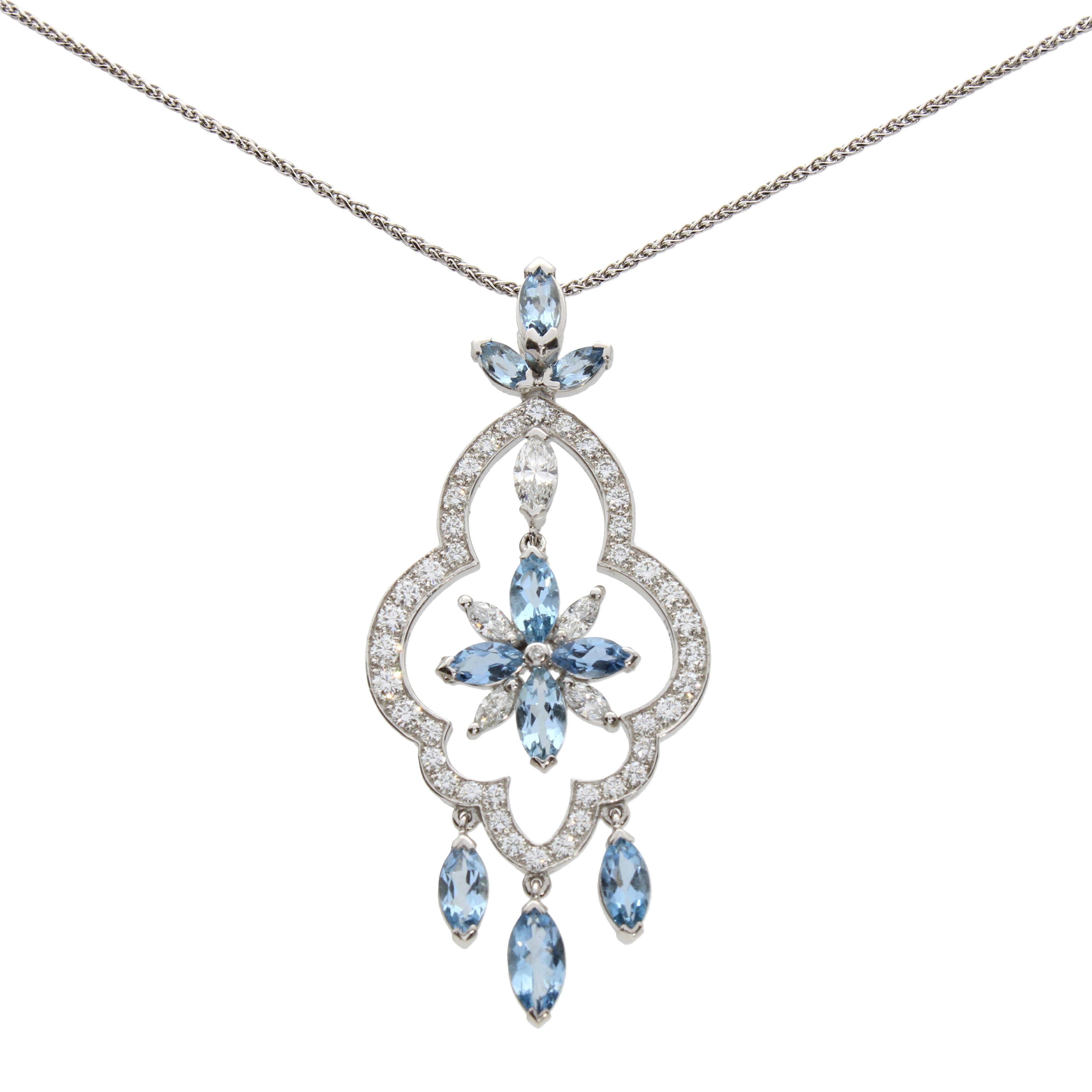 The delicate beauty of a flower, depicted in elegant marquise aquamarines and diamonds exquisitely suspended within a glittering frame of brilliant cut diamonds with marquise cut dew drops.

Details
Stella Aquamarine and Diamonds Pendant
- 18 karat
