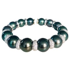 tahitian pearl bracelet white gold 18 Karat White Gold Tahitian Pearl and Diamond Bangle Bracelet