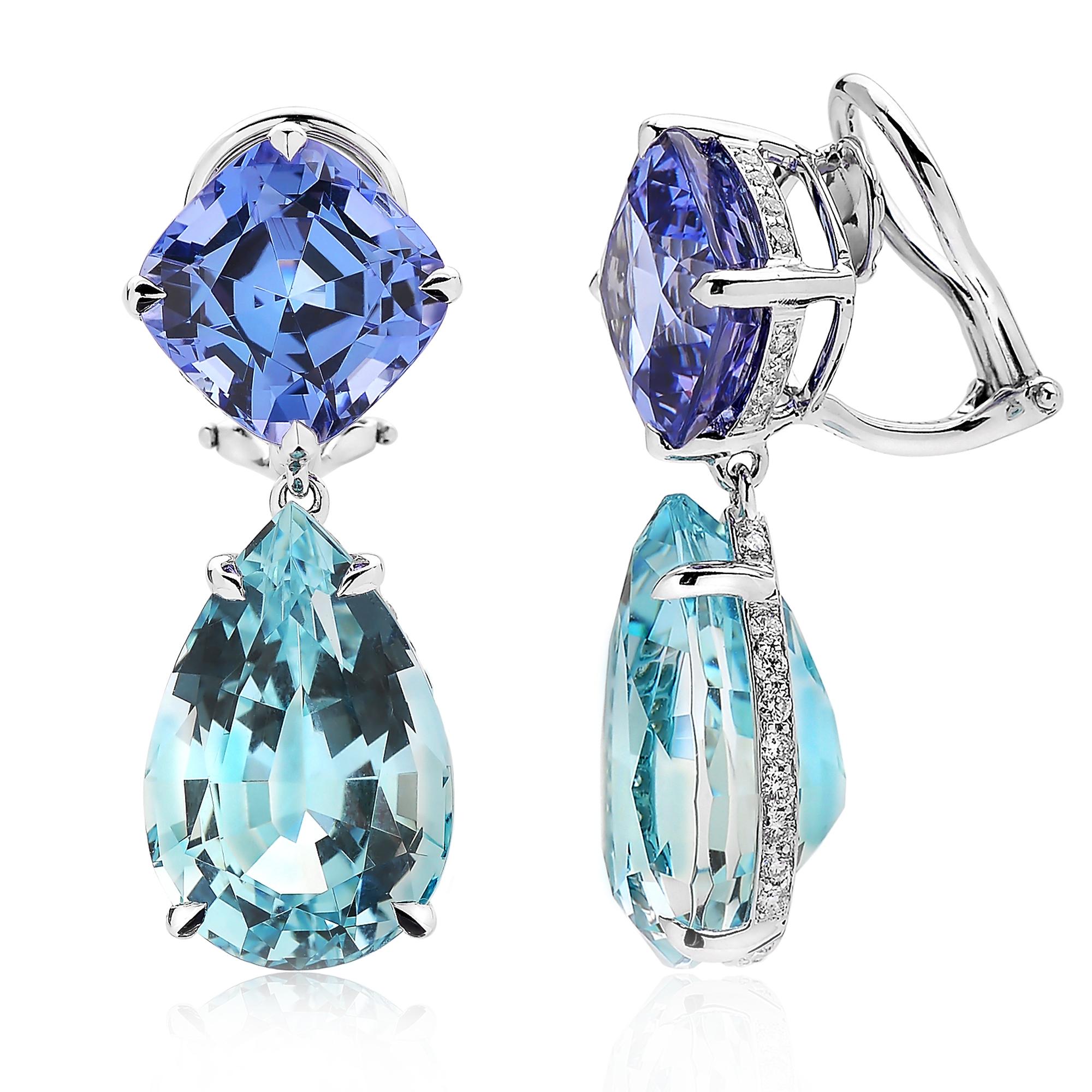 One of a kind cushion cut tanzanite earrings with pear shape aquamarine pendants set in 18 karat white gold with pave-set round, brilliant diamonds. 

Tanzanite: 10.40 carats
Aquamarine: 18.62 carats
Diamonds: 0.65 carats (D-G color, VS clarity)