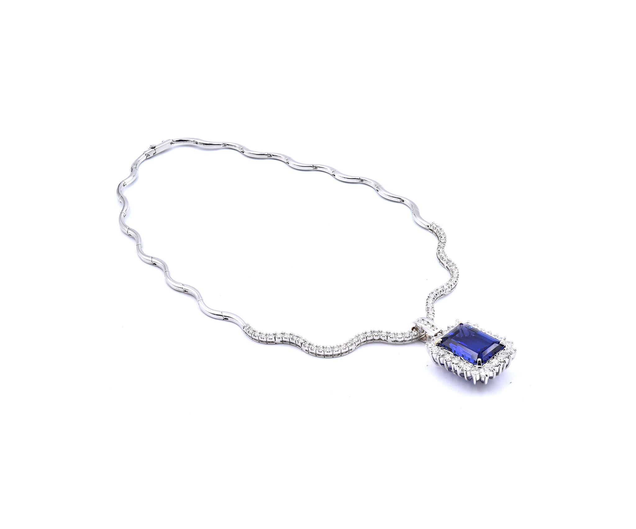 Material: 18K white gold
Tanzanite: 1 emerald cut = 18.73ct
Diamond: 82 round brilliant cut = 6.36cttw
Color: G
Clarity: VS
Dimensions: necklace measures 16-inches
Weight: 37.54 grams