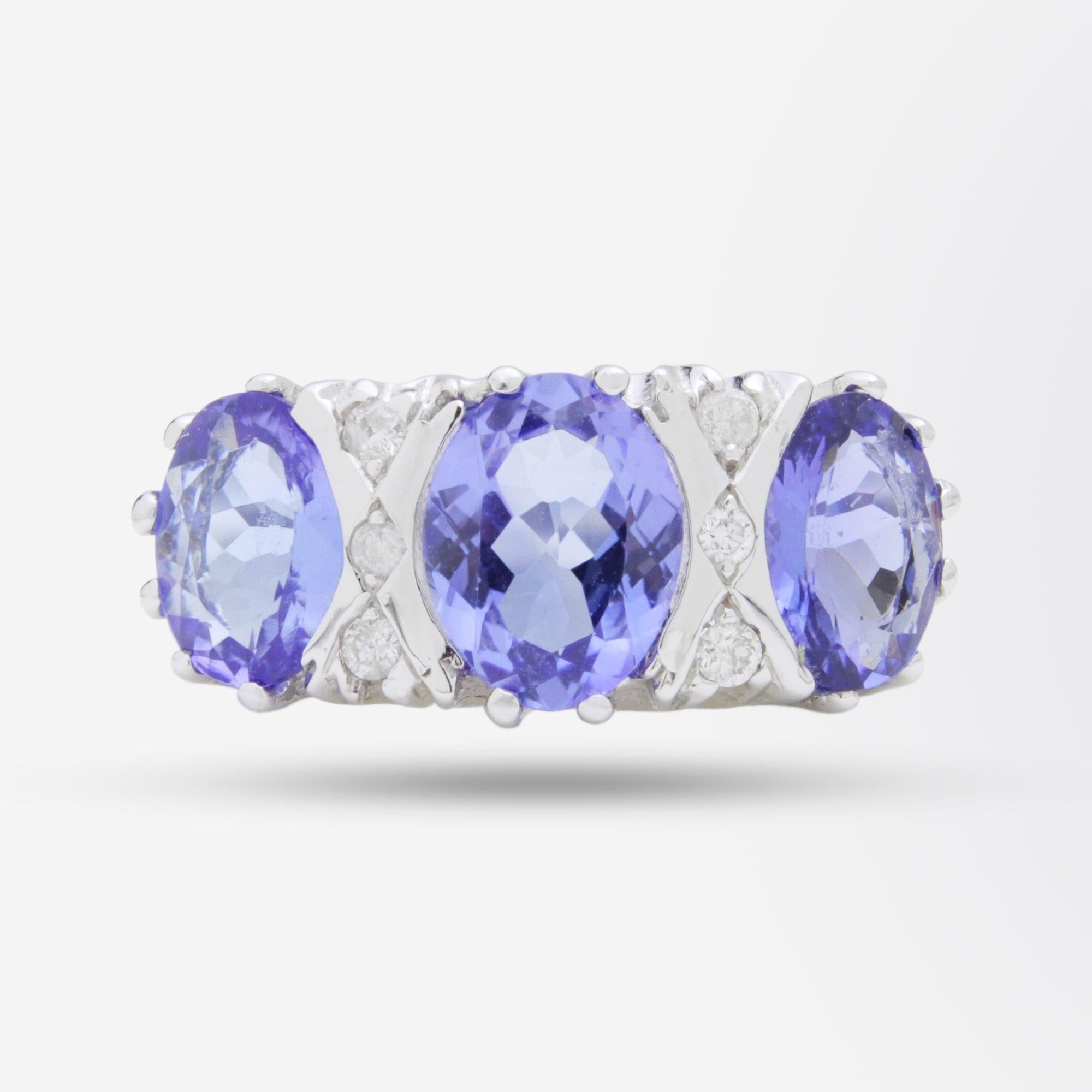 Modern 18 Karat White Gold, Tanzanite and Diamond Ring For Sale