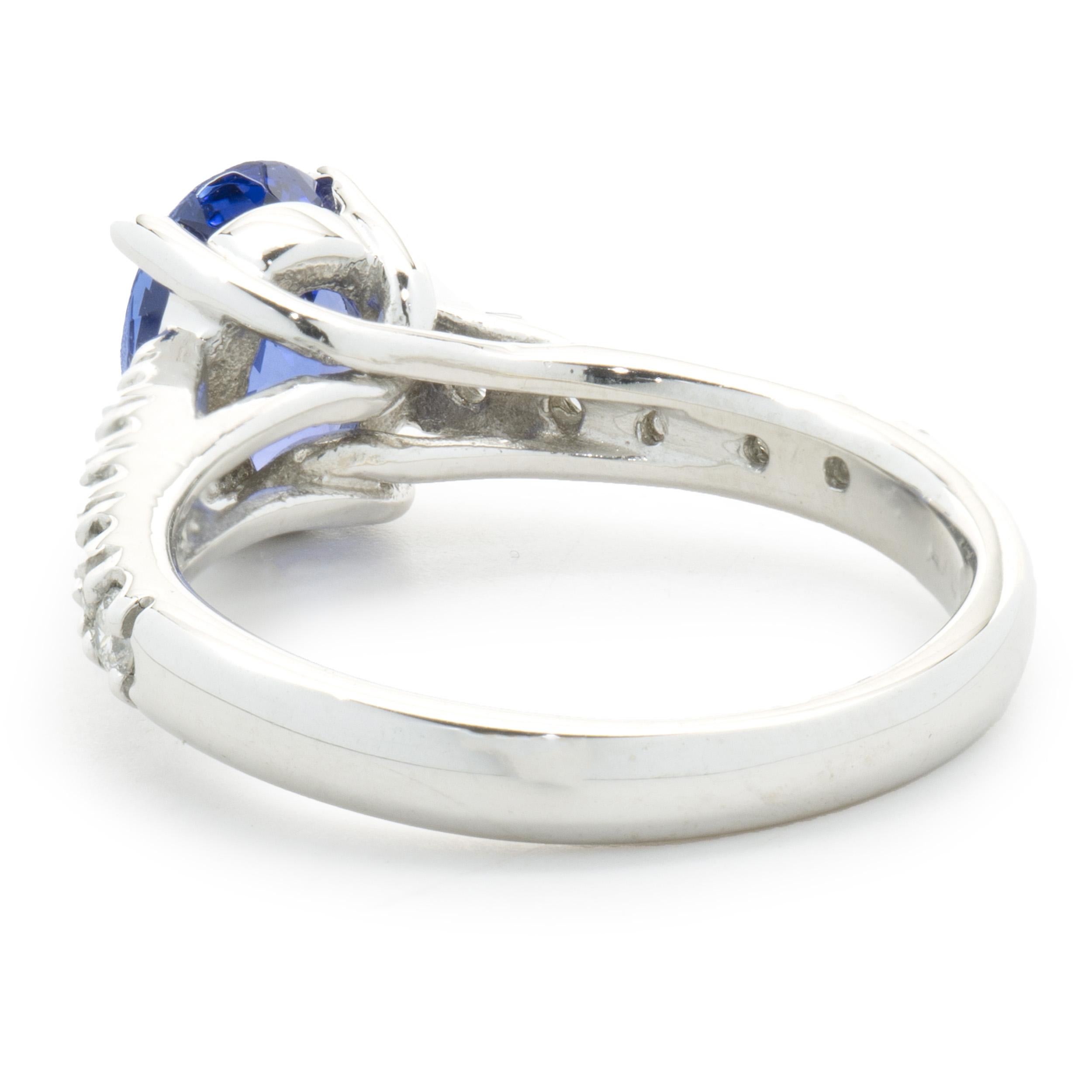 Oval Cut 18 Karat White Gold Tanzanite and Diamond Ring For Sale
