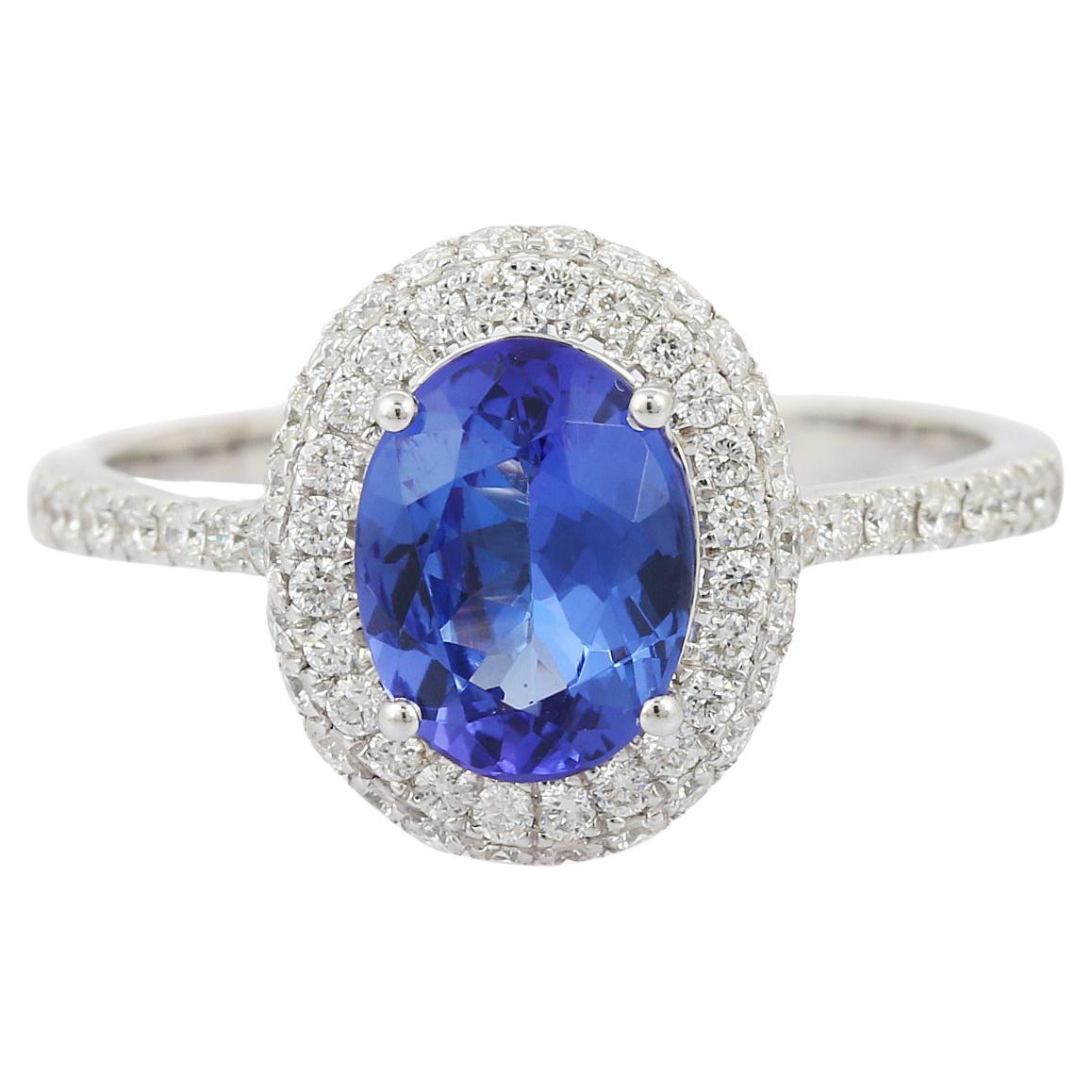 For Sale:  Statement 18 Karat Solid White Gold Tanzanite Ring with Diamonds