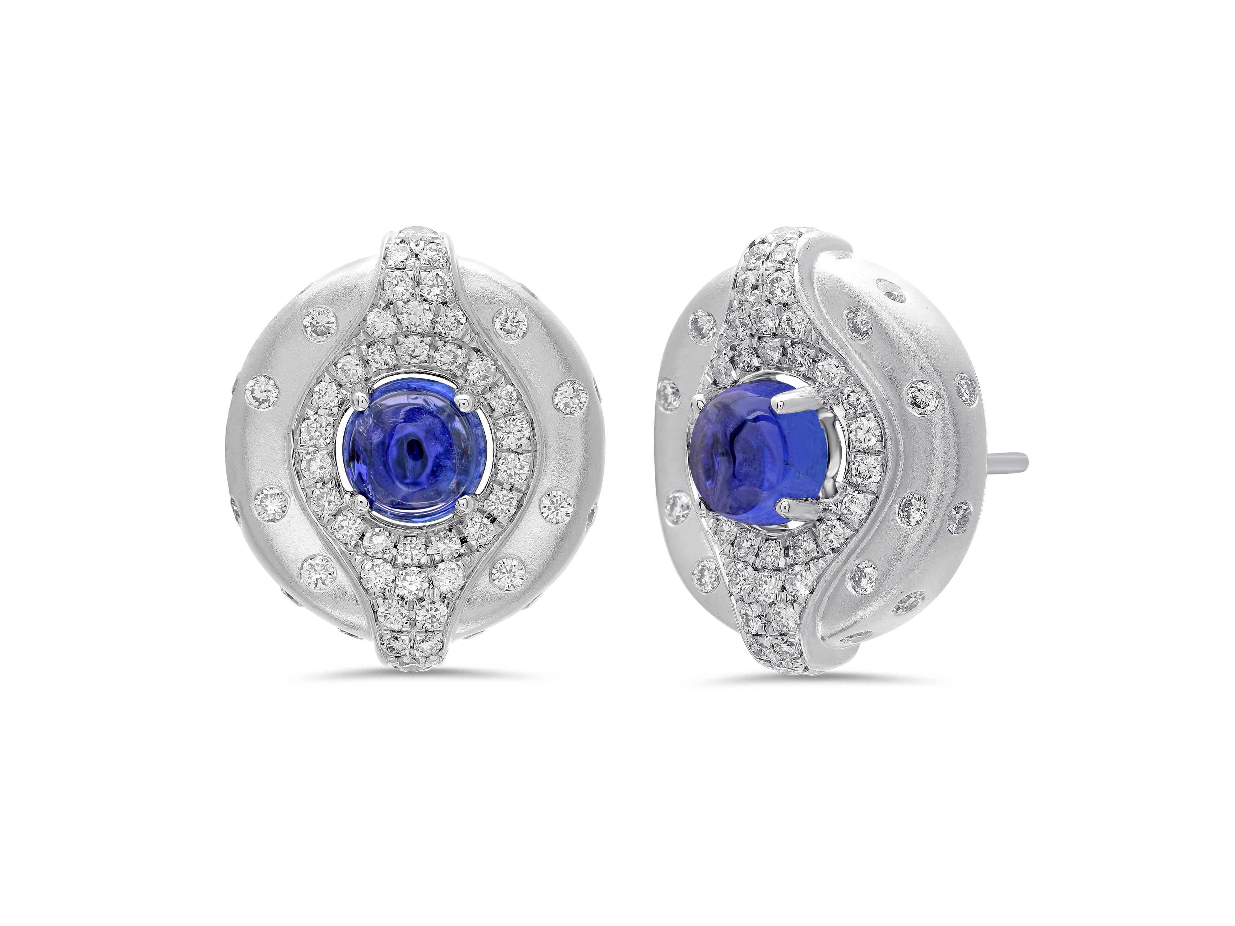 A distinct gemstone setting and varying textures combine to create the playful yet sophisticated look of Atelo’s Gypsy Collection.

These diamond stud earrings with tanzanite cabochons use various textured gold finishes and the distinct “gypsy”