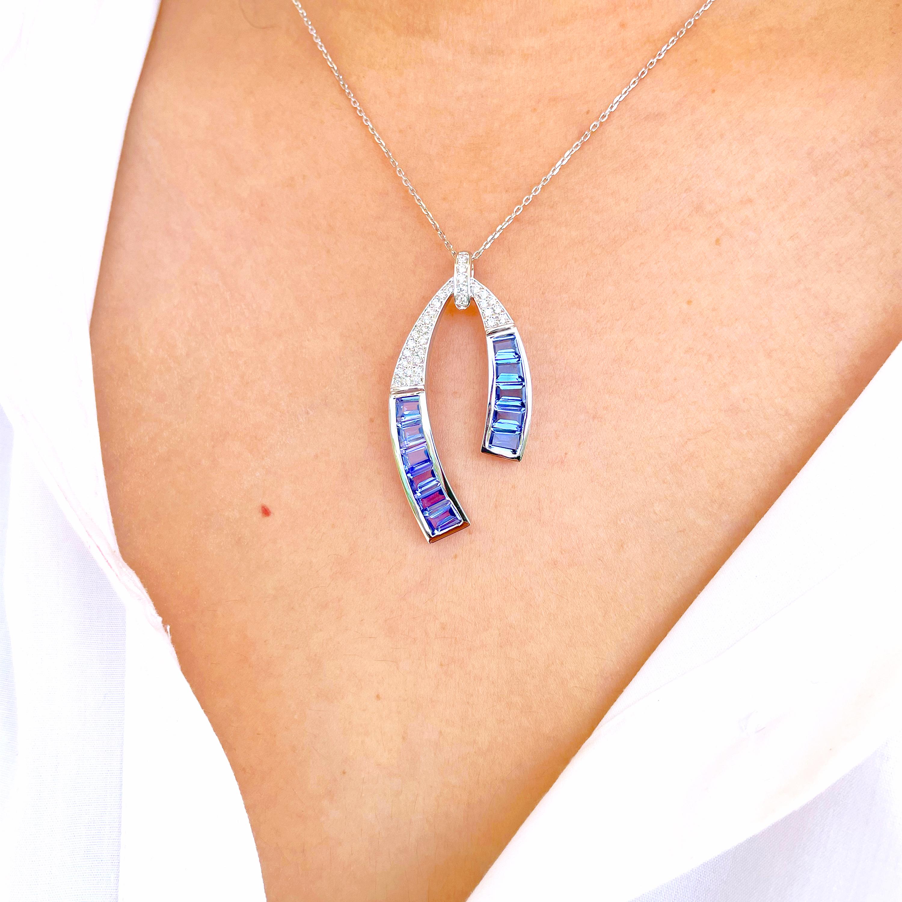 Contemporary 18 Karat White Gold Tanzanite Taper Baguette Diamond Horseshoe Pendant Necklace For Sale