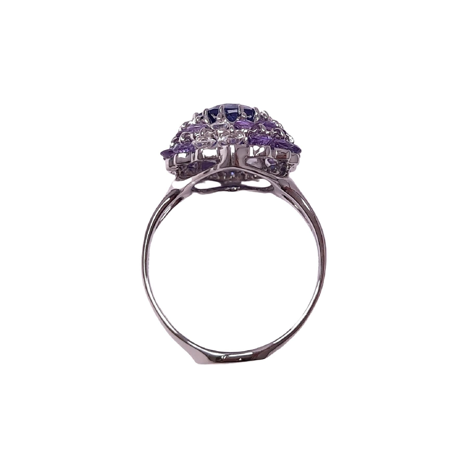 


This tanzanite and sapphire cocktail ring is from the 