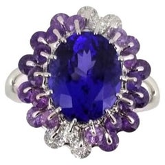 Anello con zaffiro e diamante tanzanite in oro bianco 18 carati
