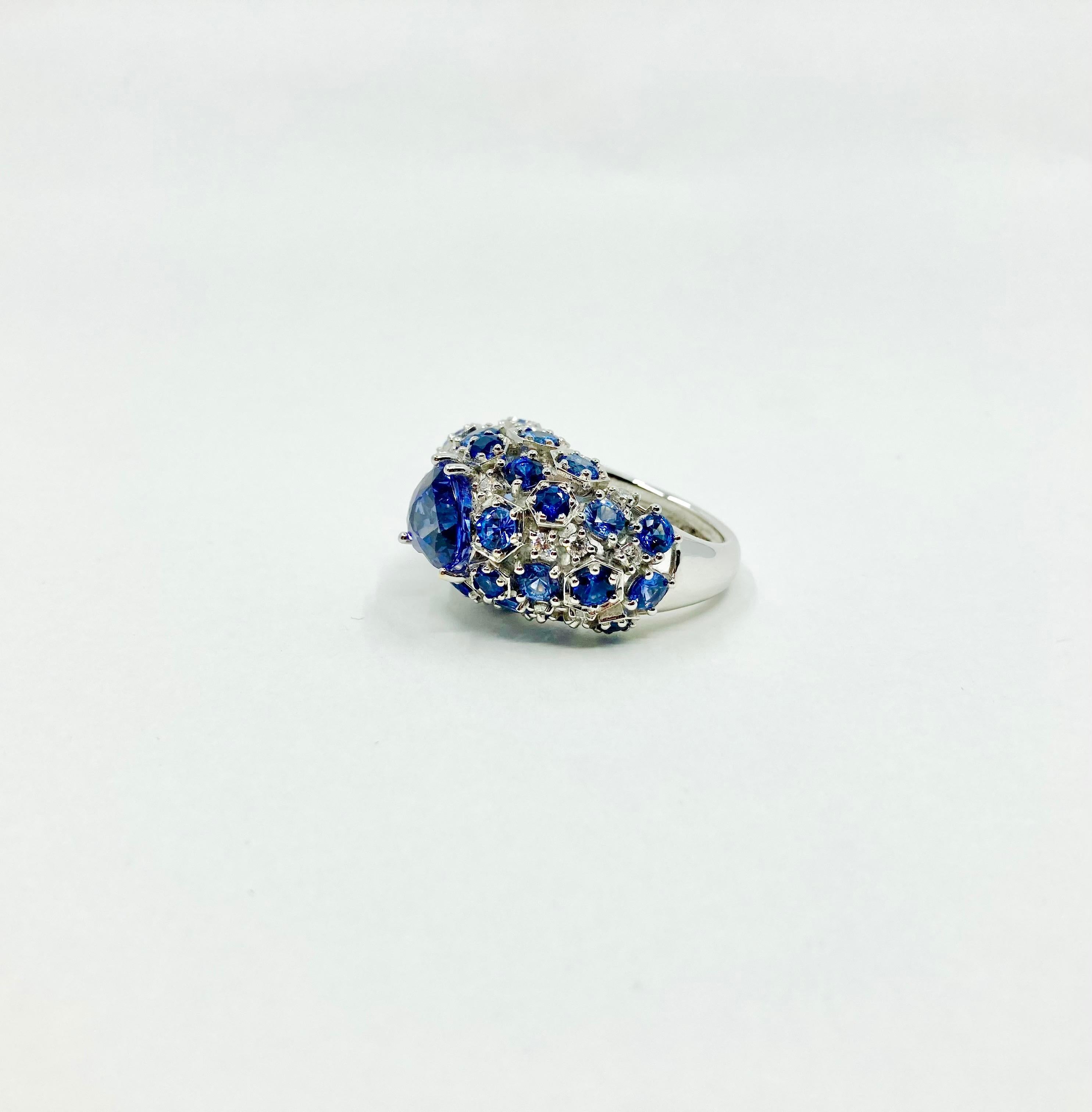 Women's 18 Karat White Gold Tanzanite, Sapphires and Diamonds Italian Ring For Sale
