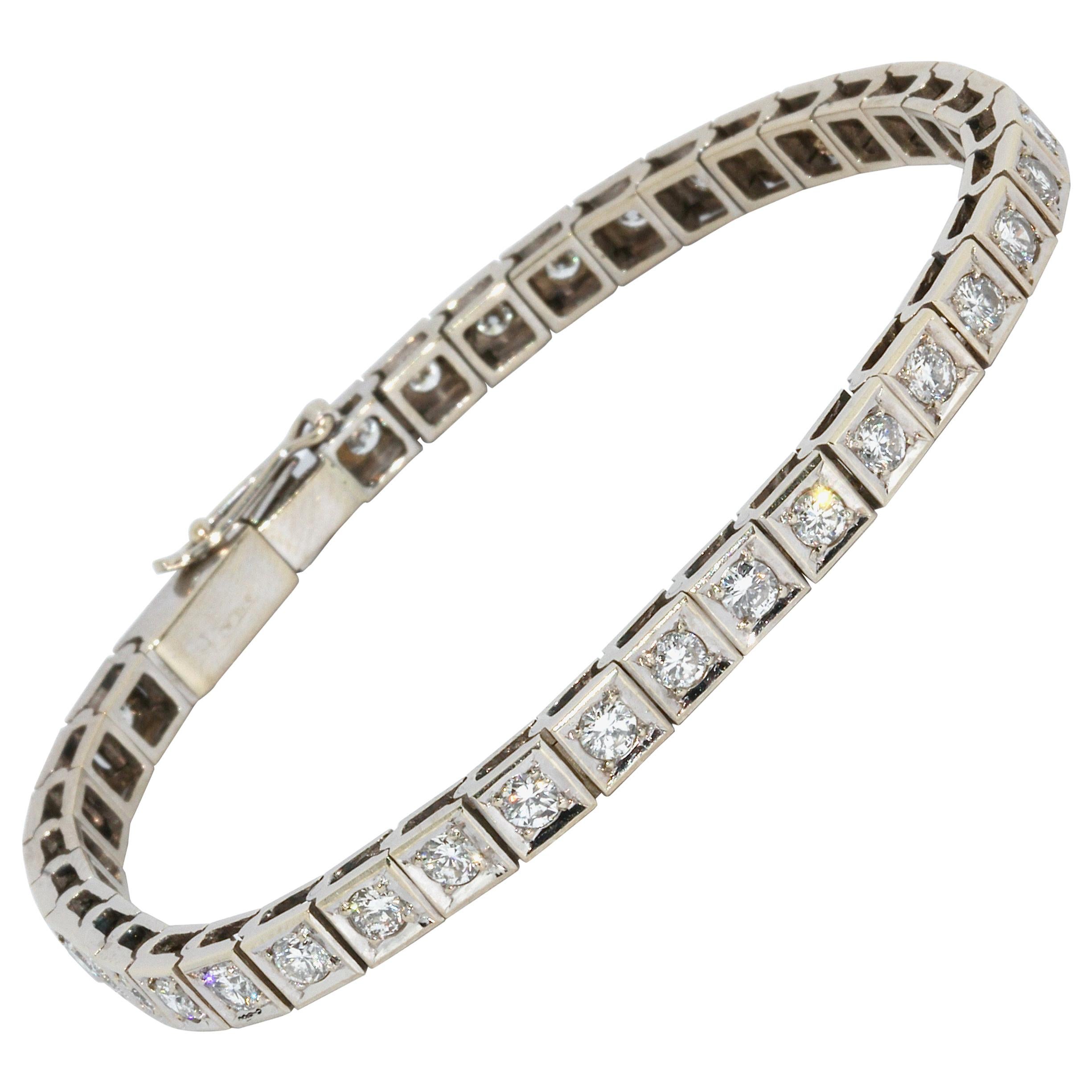 18 Karat White Gold Tennis Bracelet, Set with 38 Round White Diamonds For Sale