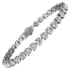 Bracciale tennis con diamanti a tre punte in oro bianco 18 carati "10 Carati