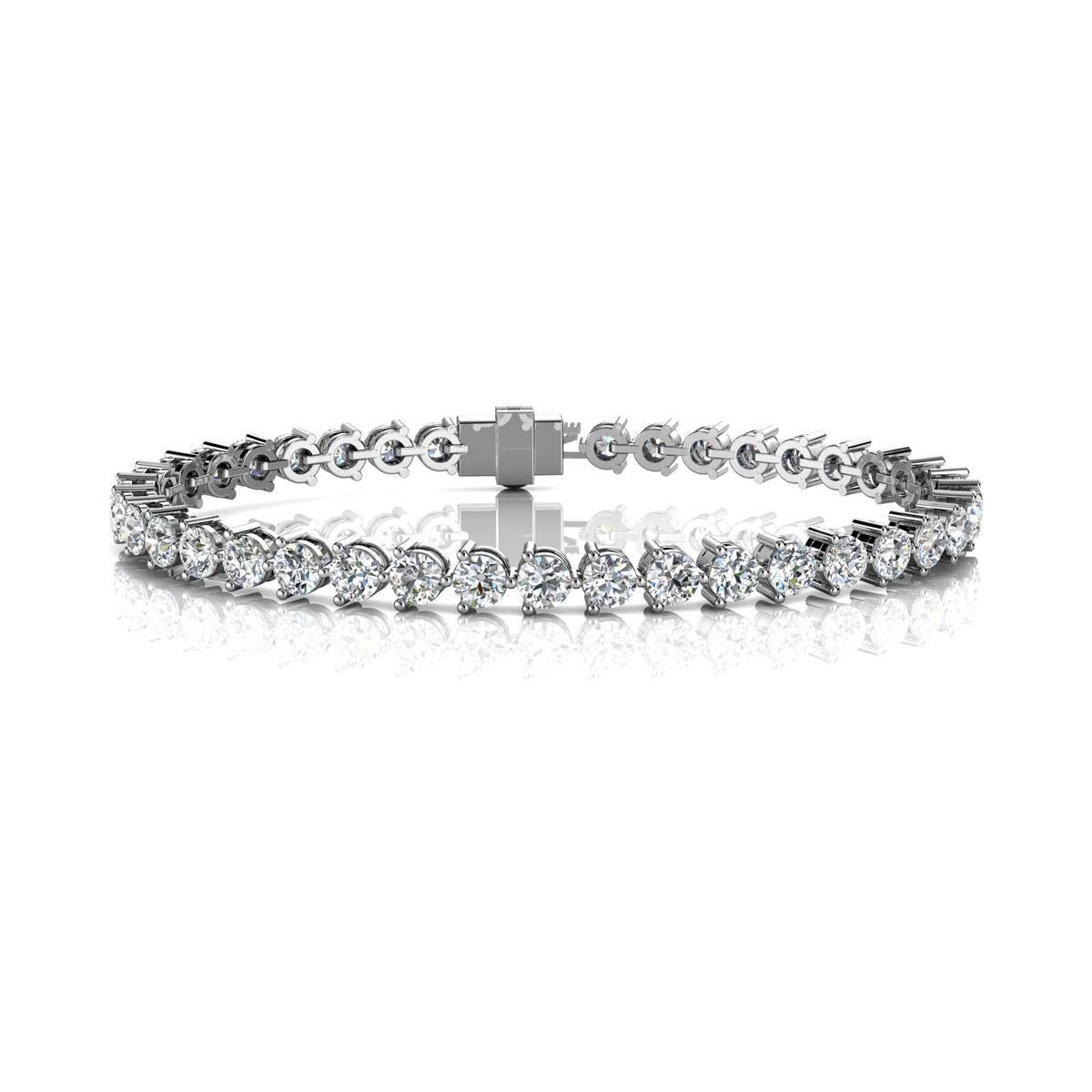 A timeless three prongs diamonds tennis bracelet. Experience the Difference!

Product details: 

Center Gemstone Type: NATURAL DIAMOND
Center Gemstone Color: WHITE
Center Gemstone Shape: ROUND
Center Diamond Carat Weight: 7
Metal: 18K White