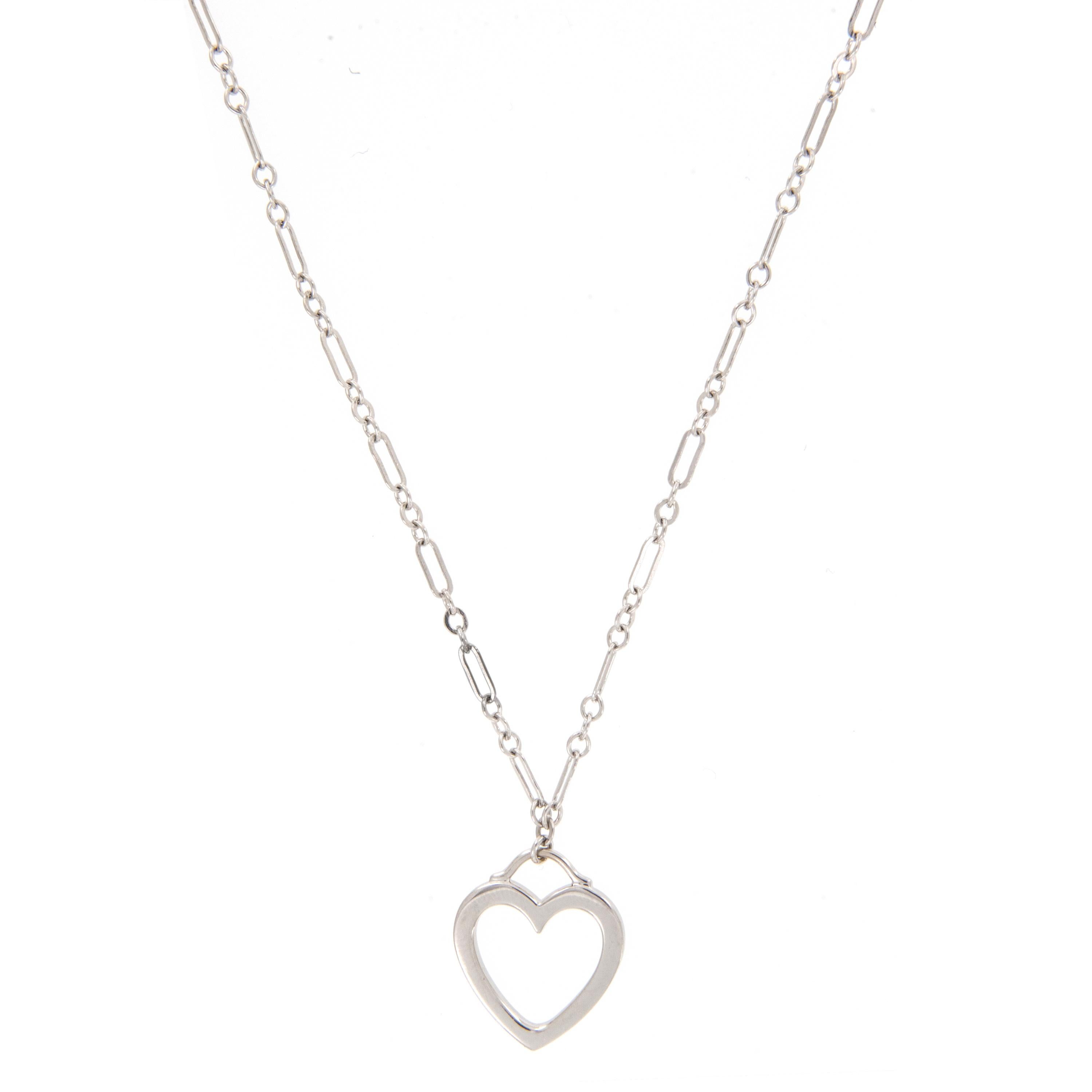 Rare & Vintage- this small 18 karat white gold Tiffany & Co open heart necklace with fancy link chain is  15.25