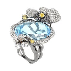 18 Karat White Gold Topaz and Diamonds Ring