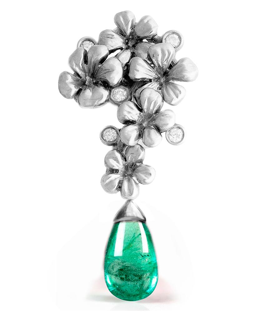 These contemporary transformer drop earrings are made of 18-karat white gold and are encrusted with 10 round diamonds and removable natural emerald cabochon drops, each measuring 9.5x7x6mm and almost 6 carats in total. The Plum Flowers contemporary