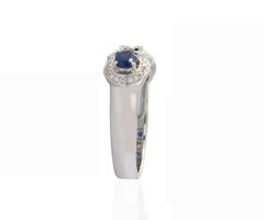 18 Karat White Gold Trio Emerald Illusion Diamond with Sapphire Stone Ring