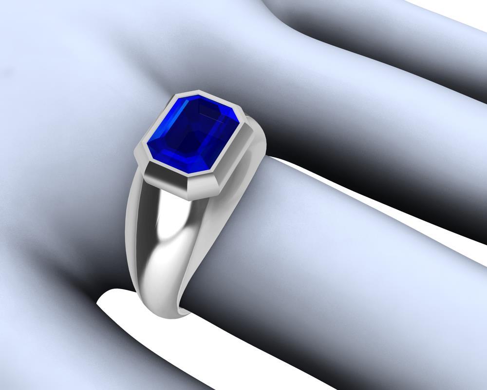 For Sale:  18 Karat White Gold Unisex Sculpture Ring 2.54 Carat Emerald Cut Blue Sapphire 9