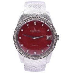 montre Universal Genève en or blanc 18 carats:: cadran diamant rouge Ref. 369115