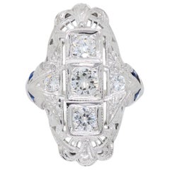 18 Karat White Gold Vintage Navette Style Diamond and Blue Sapphire Ring
