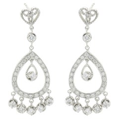 18 Karat White Gold Vintage Pear Shape Cutout Drop Earrings