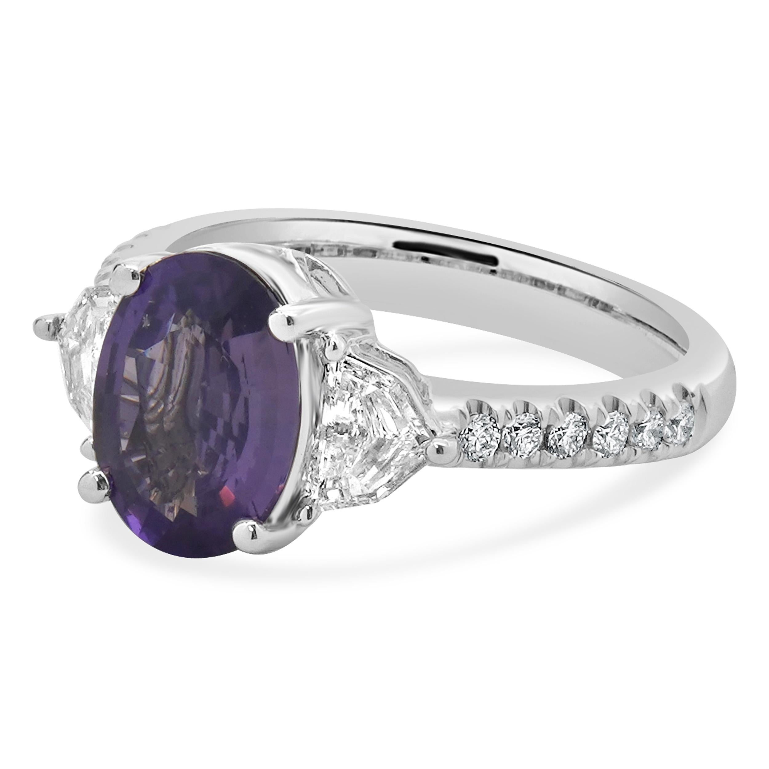 Material: 18K white gold
Sapphire: 1 oval cut = 2.41ct
Diamonds: round brilliant and shield cut= 0.65cttw
Color: G
Clarity: SI1
Ring Size: 6.5 (please allow up to 2 additional business days for sizing requests)
Weight: 5.81 grams
