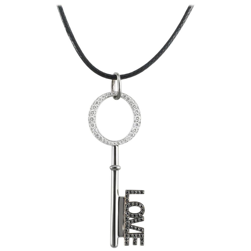 AENEA 18k White Gold White and Black Diamonds Key Pendant For Sale