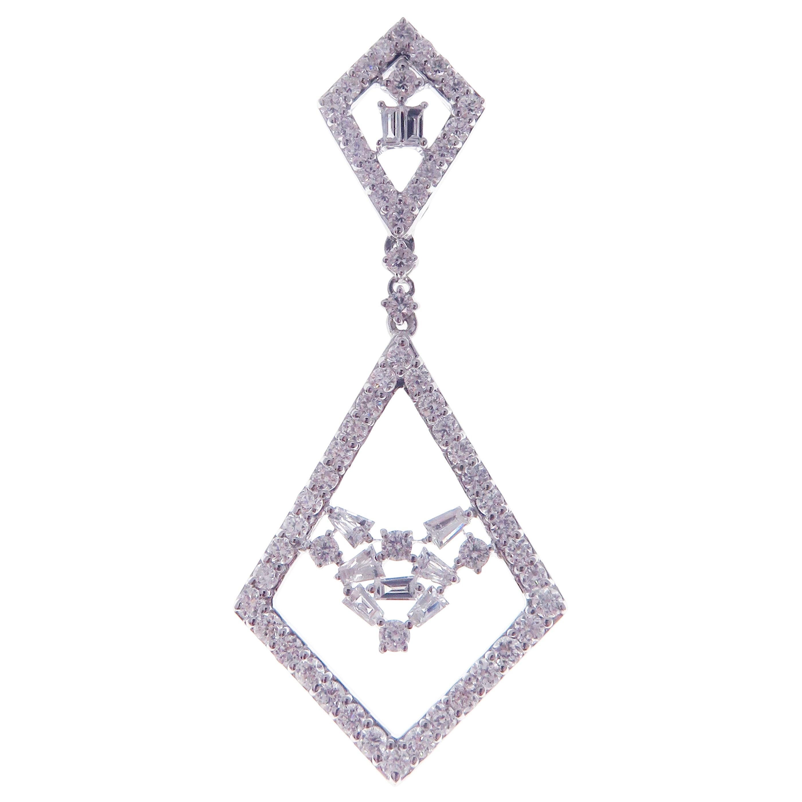 Baguette Cut 18 Karat White Gold White Diamond Symmetrical Dangling Earring For Sale