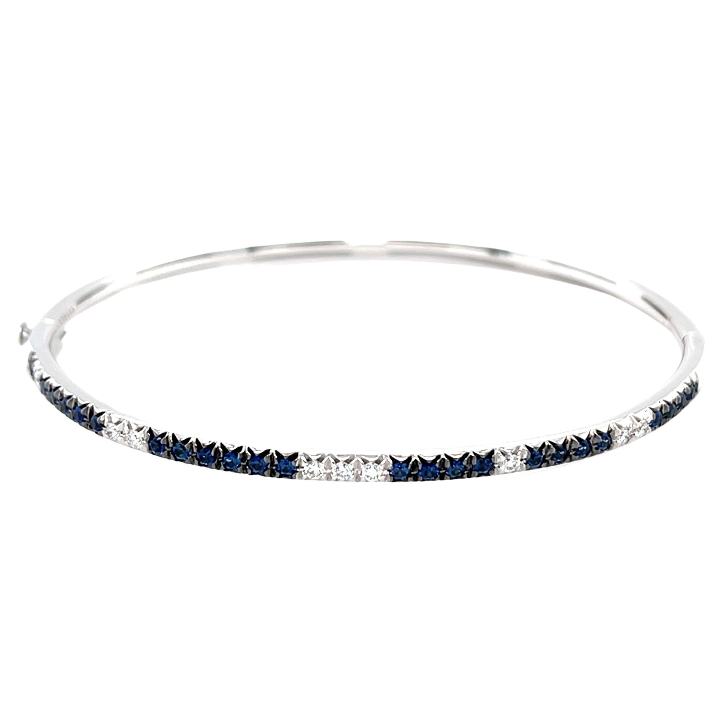 Bracelet jonc en or blanc 18 carats avec diamants blancs et saphirs bleus