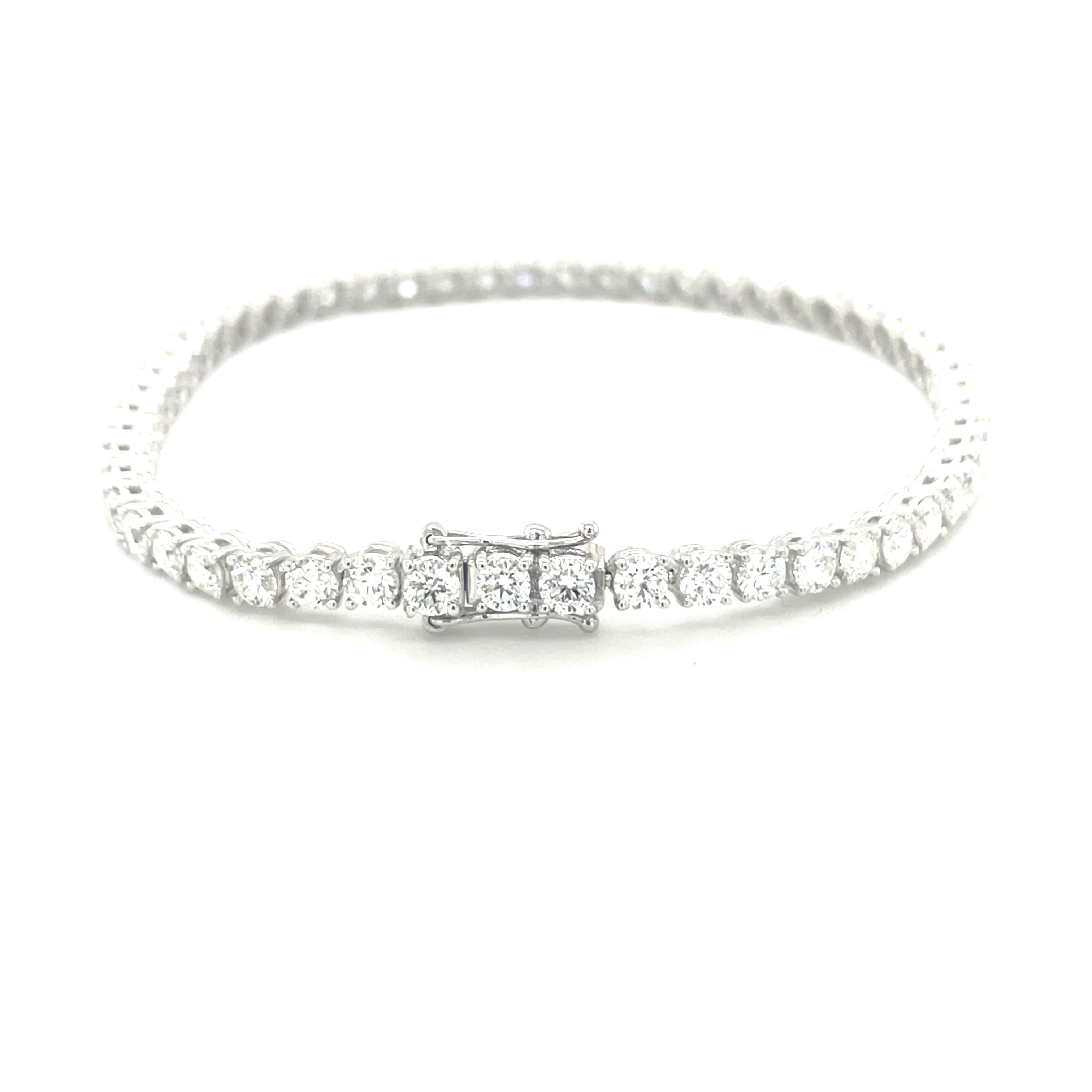 18K white gold tennis bracelet is from our Timeless collection. This beautiful bracelet is created from natural white round diamonds in G colour and SI1 clarity  in total of 6.04 Carat. Total metal weight is 9.66 gr. The bracelet is 18 cm long. Pure