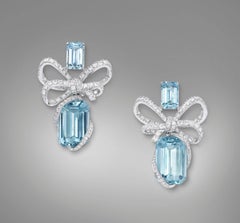 18 Karat White Gold, White Diamonds and Aquamarine Bow Earrings