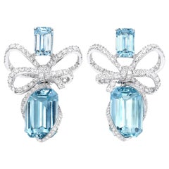 18 Karat White Gold, White Diamonds and Aquamarine Bow Earrings