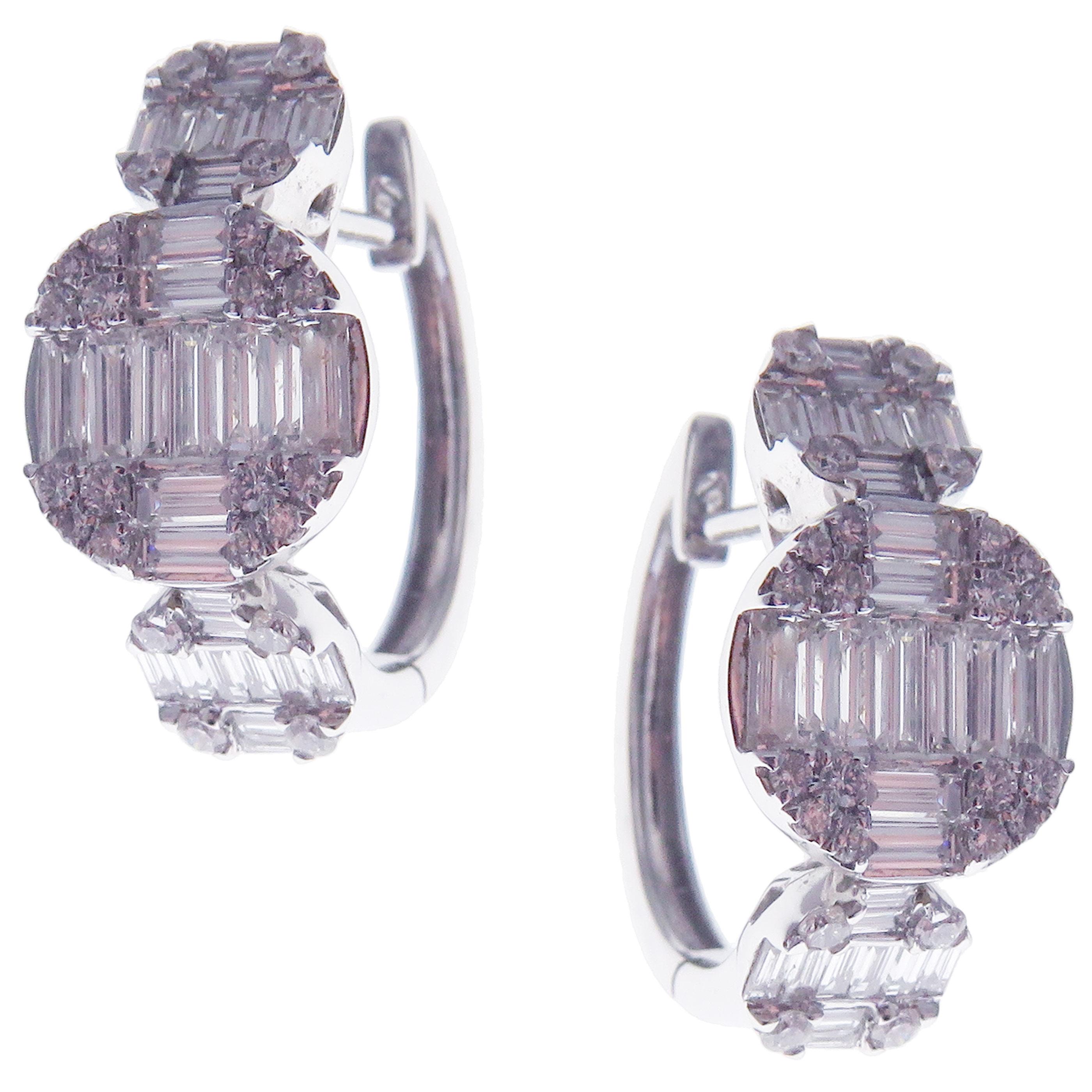 These timeless huggie earrings with circle-shaped illusion-setting white diamonds are crafted in 18-karat white gold, weighing 1.58 carats of SI-H Quality white diamonds.

48 round diamonds totaling 0.40 carats and 62 baguette diamonds totaling 1.18