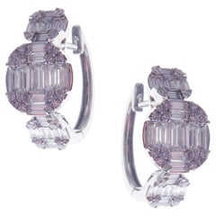 Boucles d'oreilles huggies en or blanc 18 carats avec diamants blancs en forme de cercle