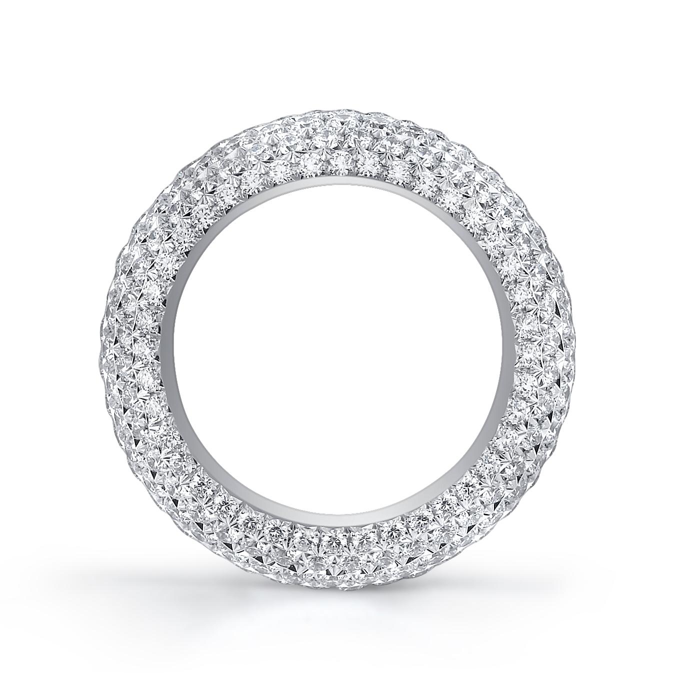 18 Karat White Gold Diamond Band, accented with French Setting Ideal Cut Diamonds. Diamond Quality G/VS2 with a Total Diamond Weight of 5.09CT. French Setting refers to the specific way that small Pavé diamonds are set into the metal of a ring. The