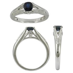 18 Karat White Gold with Blue Sapphire and Diamonds Ring