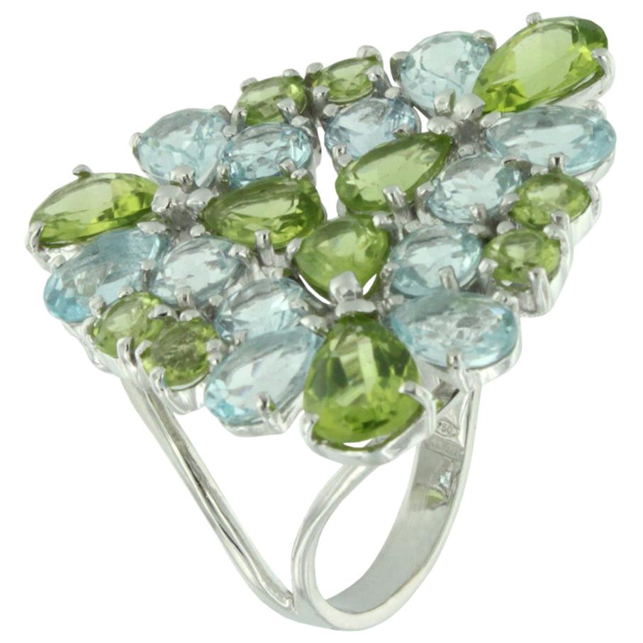 18 Karat White Gold with Blue Topaz and Peridot Ring