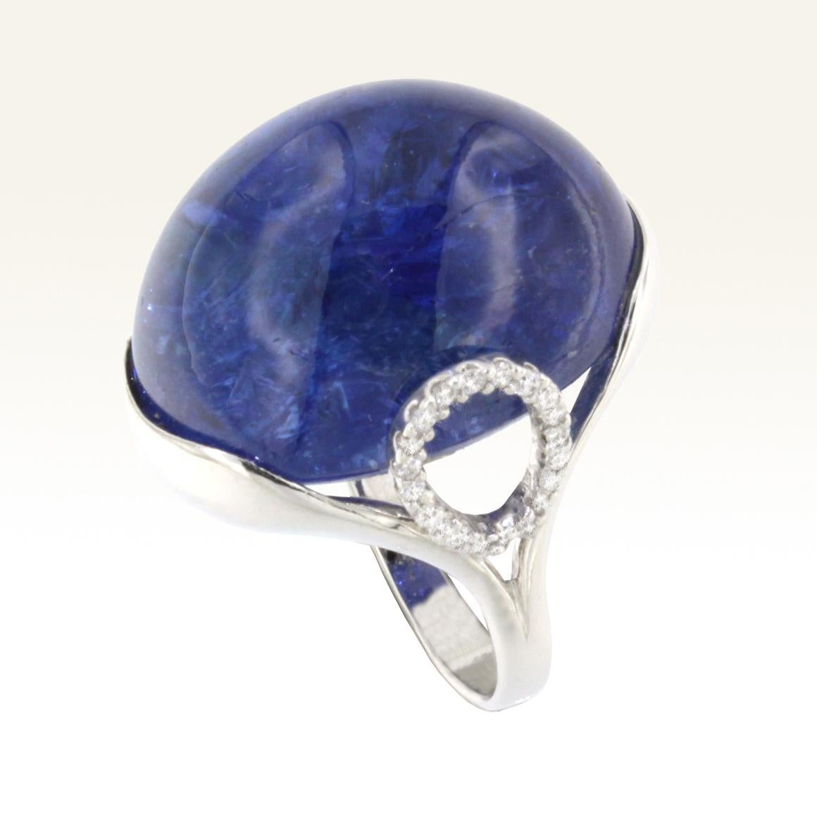 Ring in white gold 18 Karat with Tanzanite cabochon oval cut (size stone: 19x26 mm, ct 72,60) and White Diamond ct 0.40 VS colour G/H.
This ring is part of the new collection 