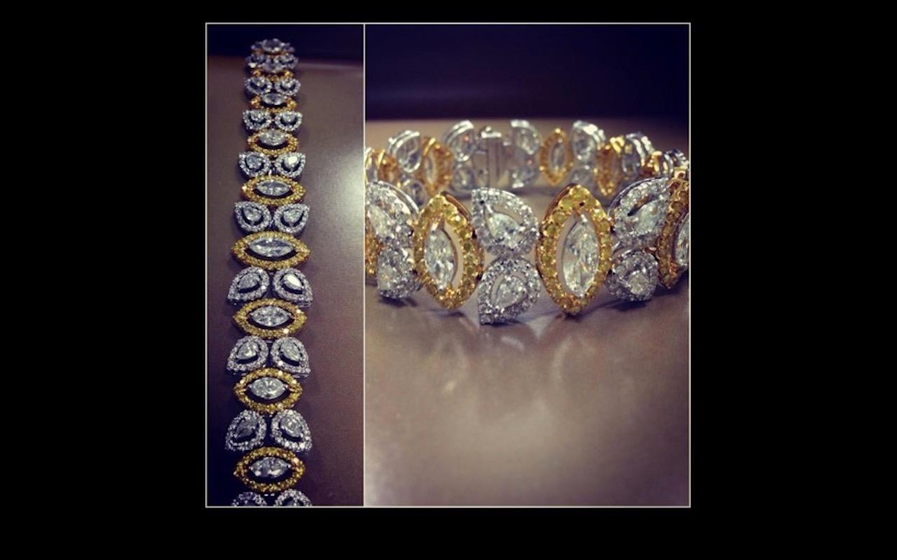 Diamond: 13.08 carats 
Gold: 37.620 grams 18k 
Colour: HI
Colour: Natural yellow fancy 
Clarity: SI
Note: This piece is available only on order according to one's wrist size and the weights could vary as it is a handmade piece 