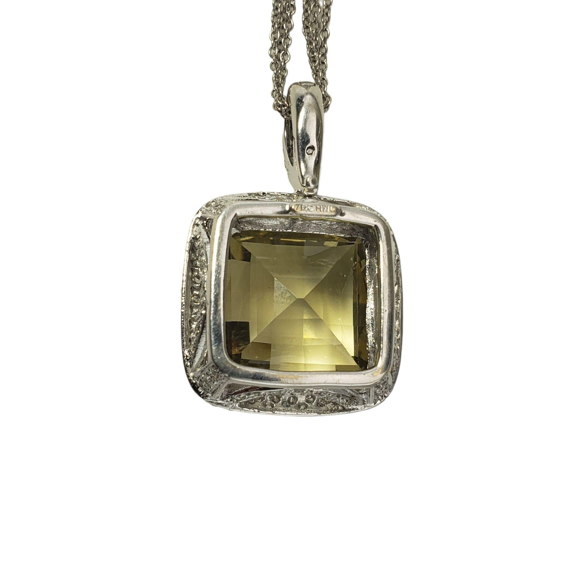 Vintage 18 Karat White Gold Yellow Quartz and Diamond Pendant Necklace JAGi Certified-

This stunning pendant features one cushion cut quartz and 124 round brilliant cut diamonds set in beautifully detailed 14K white gold. Suspends from a triple